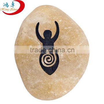 Natural engraved pebble rocks etched with spiral goddess