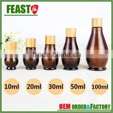 Wholesale custom 10ml 20ml 30ml 50ml 100ml empty amber glass essential oil bottle