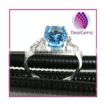 FREE SHIPING Ring sterling silver and blue topaz (natural), 7x9mm faceted oval with ten-rhinestone