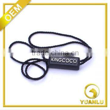 Plastic garment seal tag with string