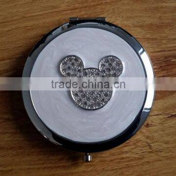 ivory epoxy resin coated folding makeup mirror with bunny decor