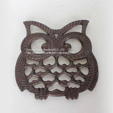 Cast iron owl table trivet