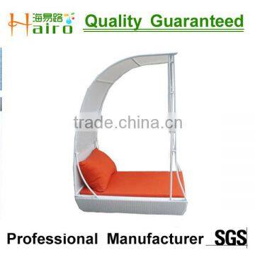 outdoor rattan bed with canopy