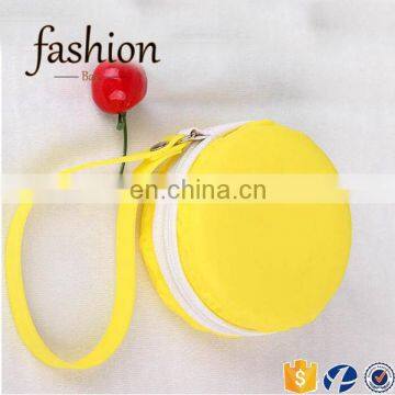 CR best selling products in europe earphone bag lovely round shape yellow fashion noble squeeze coin purse