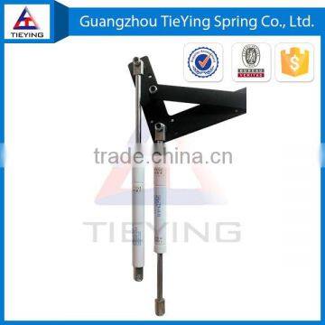 Bed lift mechanism supported by gas spring