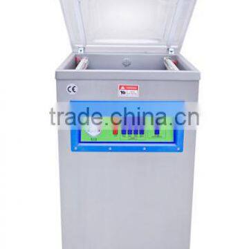 Vertical vacuum packaging machine