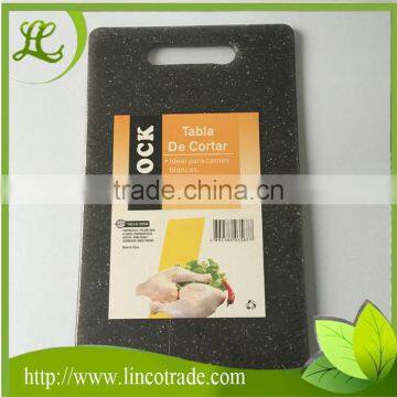 Cutting board/chopping block with handle