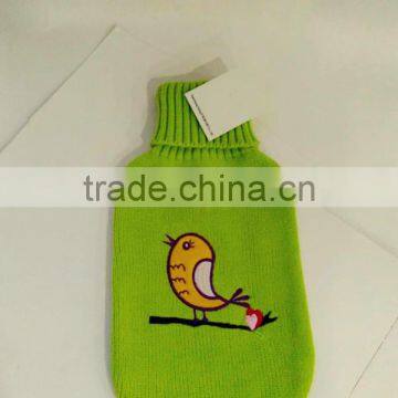 green hot water bag kintted yellow bird cover