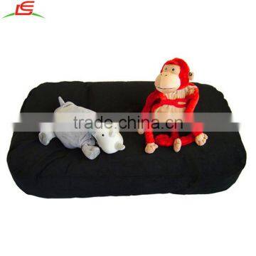 custom monkey rhinoceros plush dog toys on bean bag dog bed