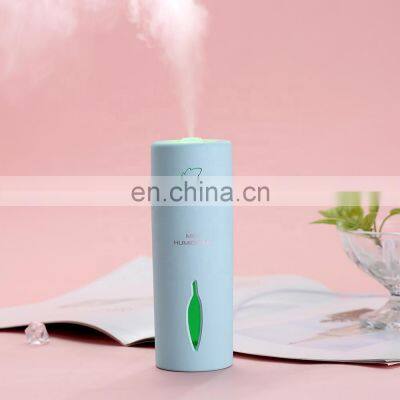 Factory sale potable handle small humidifiers air humidifiers and Colorful atmosphere lights face humidifier for Baby room Car