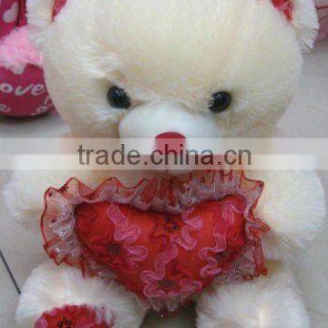 plush teddy bear with heart