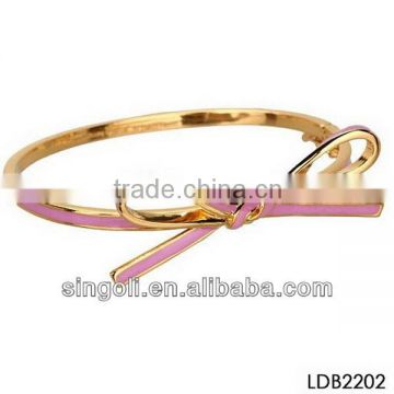 Enamel bow bangle for young girls in ameriaca                        
                                                Quality Choice