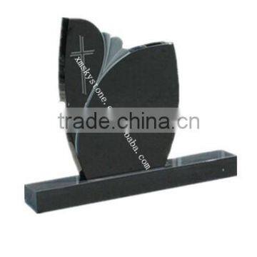 European style black granite tombstone with cross