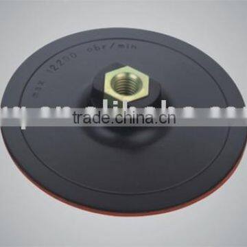 Plastic backing sanding pad