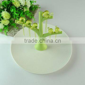 Cheap stock porcelain round dessert ceramic plate with plastic stick wholesale