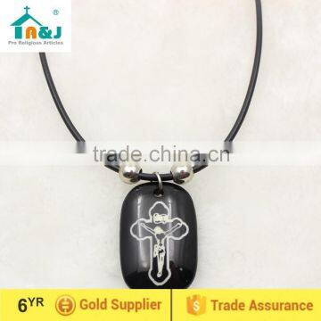 Plastic cross cord pendant