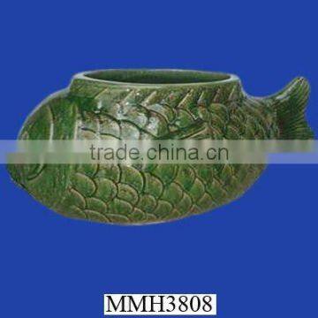 Decorative green ceramic fish planter