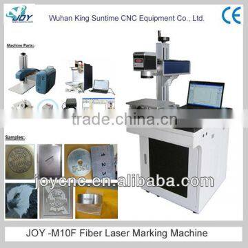 JOY fiber is widely used for the notebook watches JOY CNC Fiber Laser Marking Machine