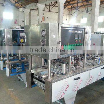 Yogurt cup filling and sealing machine