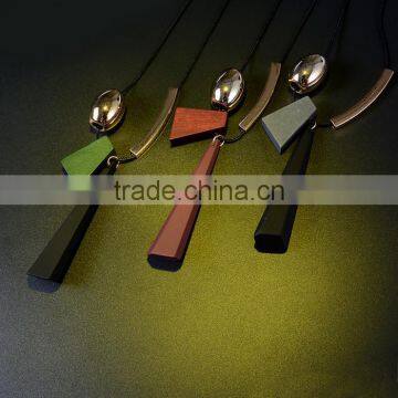 Geometric Wood Bead Pendant Necklace Gold Curved Tube Bead Black Chain Necklace Geomotric Rubber Pendant Long Sweater Necklace photo-2