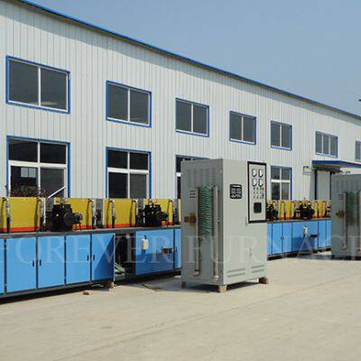 Reinforcing bar induction heat treatment process