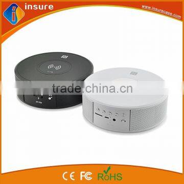 new design wireless charging speaker bluetooth for cellphone