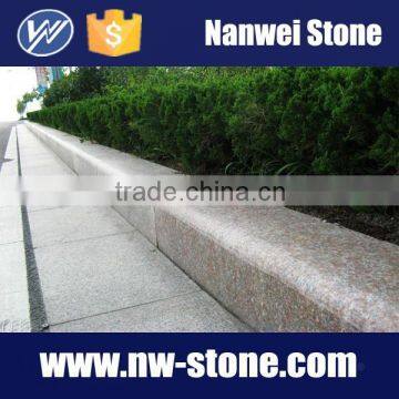 red, polished granite kebstone, sideway