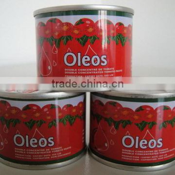 Top quality canned tomato paste packed in tins or sachets or barrels