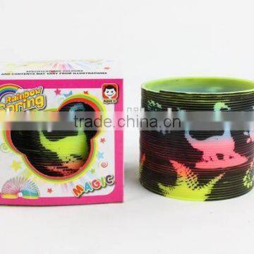 plastic magic rainbow spring toys with printed dinosaur/hot sale rainbow circle