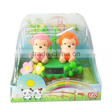 Bright-colored Solar Monkey Couples For Car