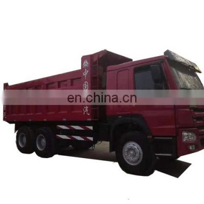 Original howo truck with low price ,  howo 8x4 truck in stock , cheap howo 371/375hp dump truck low bed