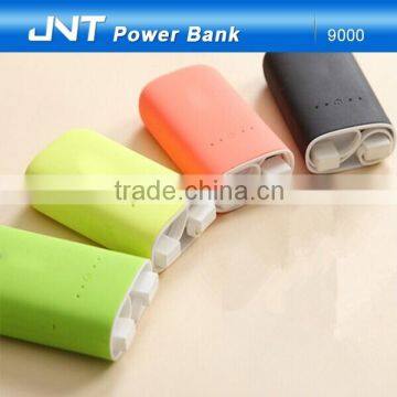 Wholesale Silicon coating 8000mah power bank with build-in charging cable 9000