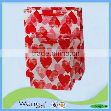 Printed new fancy design red foaming paper bag with handle for packaging made in china