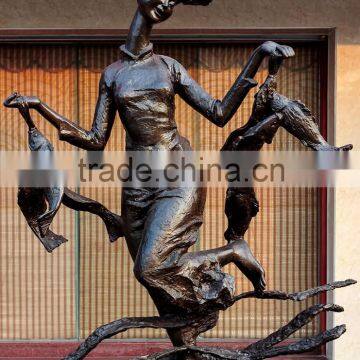 Bronze abstract girl with goose sculpture