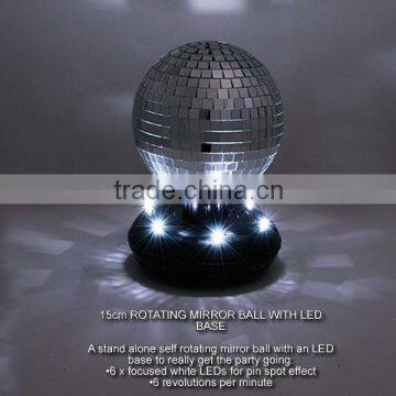 Rotating mirror ball with led base