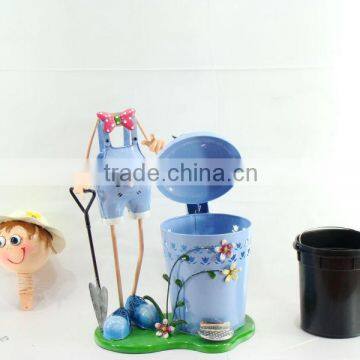 Metal doll outdoor garbage bin for garden decor