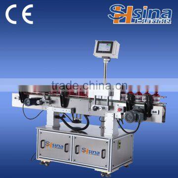 Vertical round bottle positioning sticker labeling machine