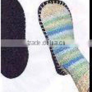 Soled shoes with white blue stripes