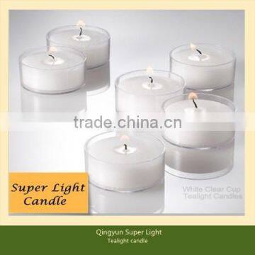 white tealight candles in clear cups
