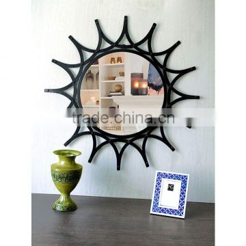 Black wrought metal wall mirror