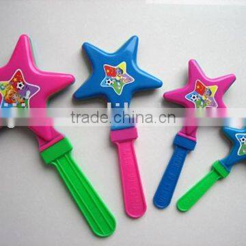 clapper,noisy clapper,clacker