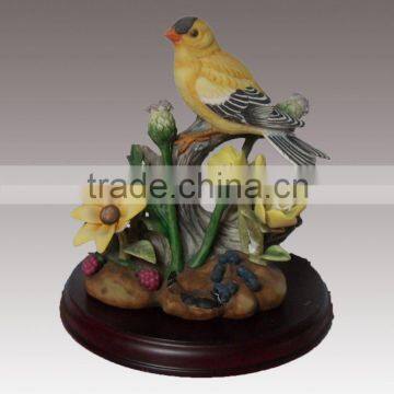 Ceramic yellow bird and flow