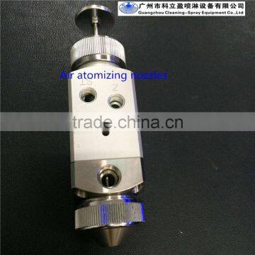 Air atomizing spray gun for coating machine