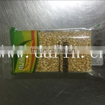 Sesame candy bar making machine, peanut chikki cutting machine