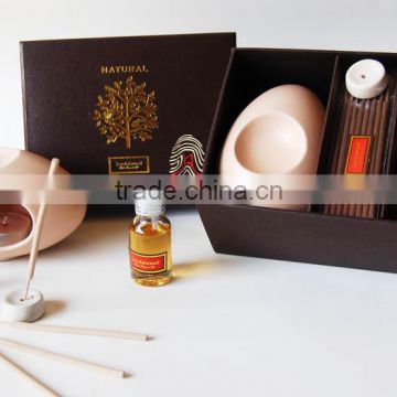 Cream egg-shaped ceramic essential oil burner perfume lamp with incense sticks