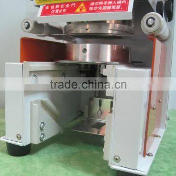 Full Auto Cup Sealing Machine/ Plastic Packaging Material and Electric Driven Type Puffed Food Auto Filling Sealing Machine photo-3