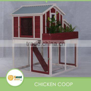 Wooden chicken coop with flower planter