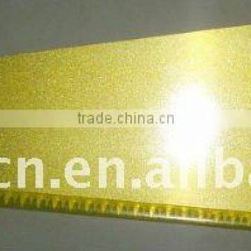 golden teflon coated hand saw with wood handle