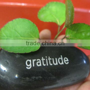 Basalt wish stones with engraved word