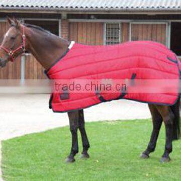 Padded winter equestrian rug for horse riding